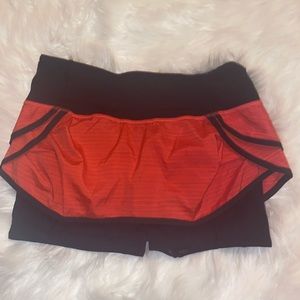 Red and black Lululemon skirt/shorts